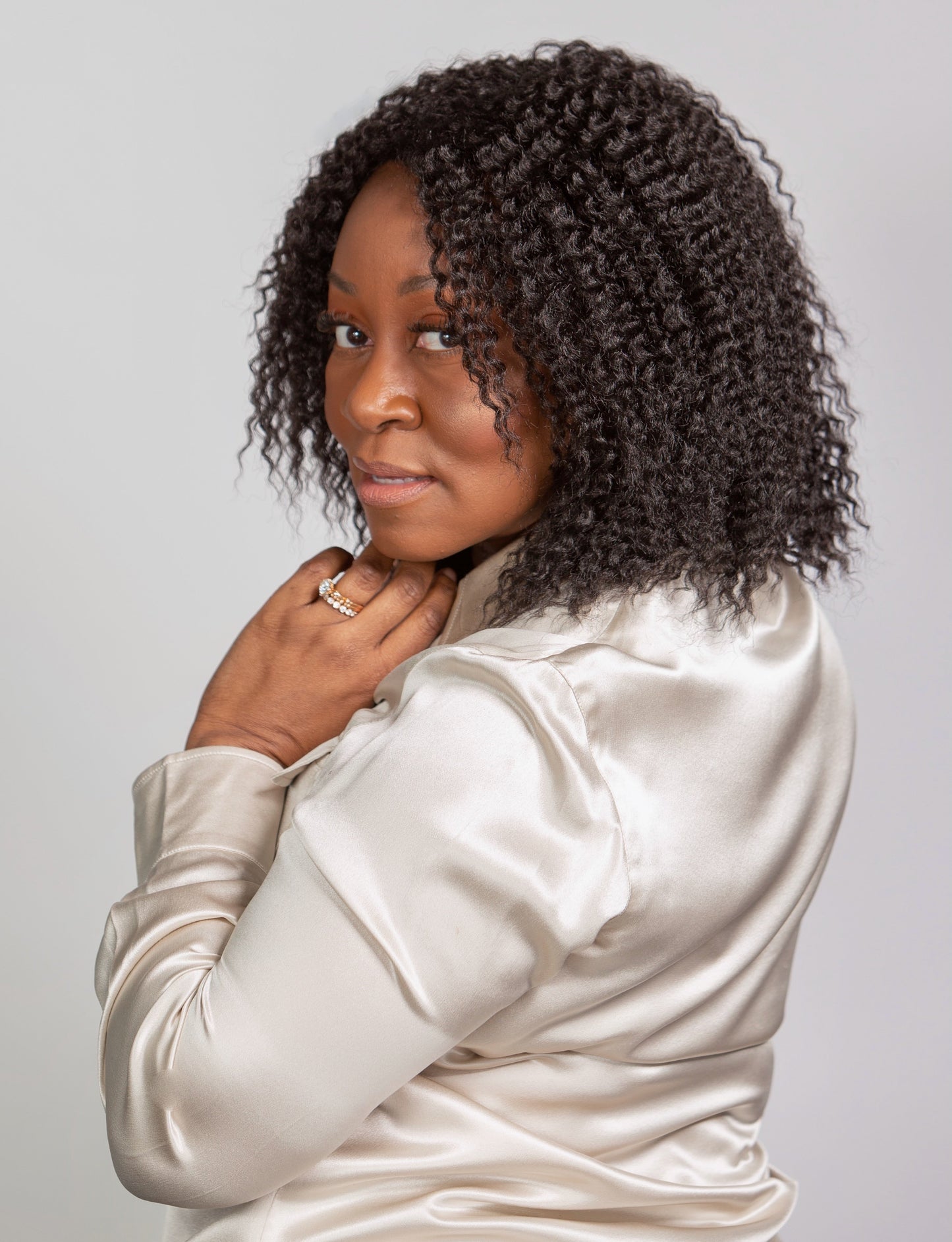 black woman wearing Imani wig black